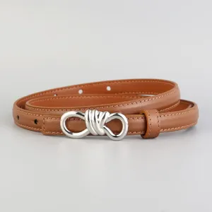 Women leather belt detail, thin brown strap with elegant silver knot buckle for jeans.