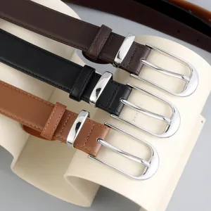 Detailed close-up of women's genuine leather belts with silver metal pin buckles in three colors.