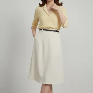 Minimalist thin leather belt detail showcasing chic H-buckle, perfect for elegant outfits.