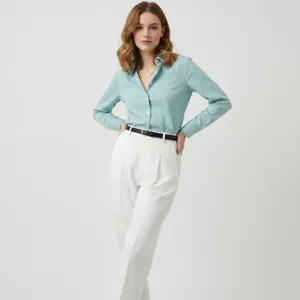 Details showing minimalist black leather belt paired with chic outfit for women elegance.