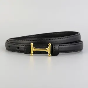 Detailed view of women's black genuine leather thin belt with elegant gold metal buckle design.