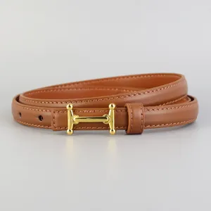 Slim brown leather belt for women with elegant gold metal buckle, chic daily accessory.