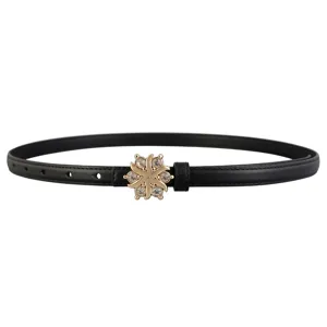 Women's slim black leather belt featuring a sparkling crystal floral buckle for dresses jeans.