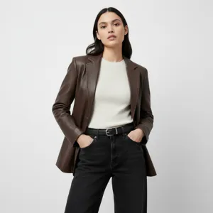 Classic women's leather belt with a sleek metal buckle, stylish accessory for casual outfits.