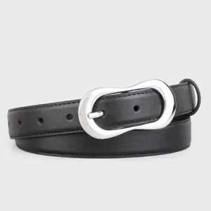 Detailed shot of black leather belt with silver irregular buckle, elegant and versatile accessory.