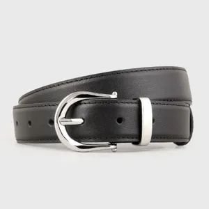 Minimalist black leather belt detail for women featuring a sleek silver metal buckle.