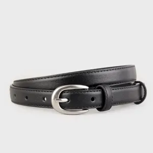 Close-up of a sleek black leather belt with silver pin buckle and neat stitching details.