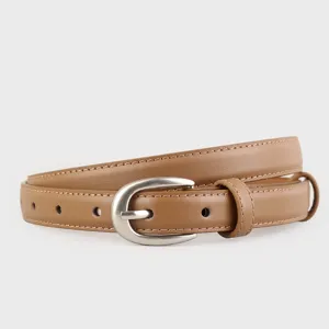 Womens brown leather belt with metal pin buckle, stylish accessory for jeans and casual pants.