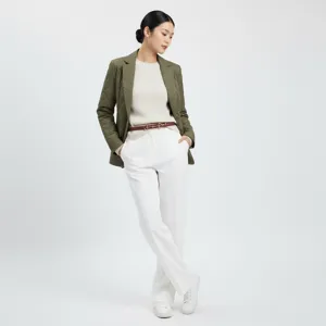 Detail shot of a women's vintage thin leather belt paired with casual chic daily outfit.