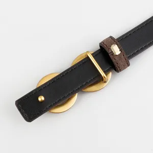 Elegant women's genuine leather belt with stylish gold hardware circles for jeans and dresses.