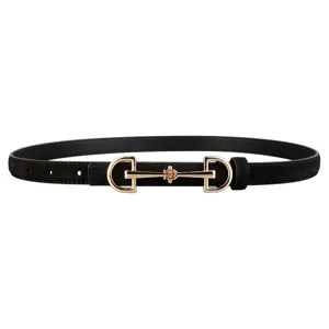 Close-up detail of the vintage black suede women dress belt with elegant gold-tone horsebit buckle.