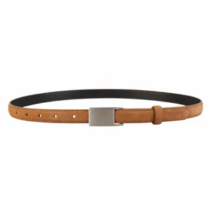 Brown suede belt detail, retro matte cowhide leather texture with silver metal buckle, close-up.