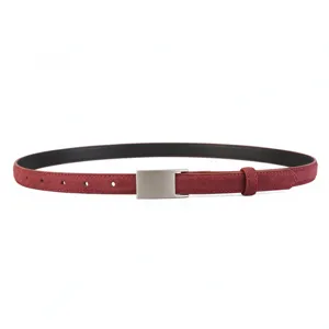 Close-up detail showing the rich burgundy suede texture and polished silver buckle of the belt.