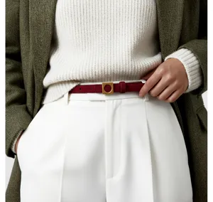 Elegant slim genuine leather belt in rich burgundy with a sleek gold buckle, perfect detail.