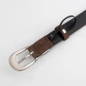 Black leather belt detail showing silver metal buckle and brown suede loop design nicely.