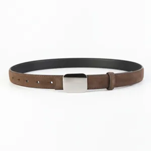 Close-up detail of women's brown suede belt with sleek polished square metal buckle design.