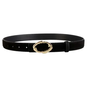 Close-up of black suede leather belt featuring a unique irregular gold metal buckle design.