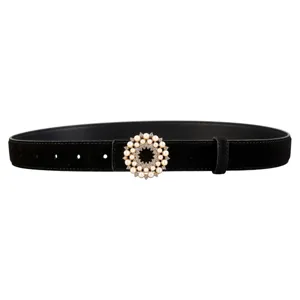 Black suede belt detail featuring a sparkling pearl rhinestone round buckle accessory.