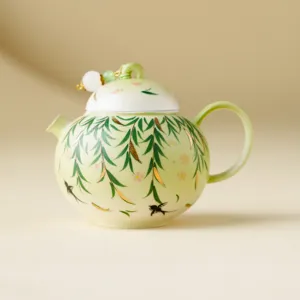 Ceramic teapot with willow and swallow pattern, elegant green single tea pot for home kung fu tea.