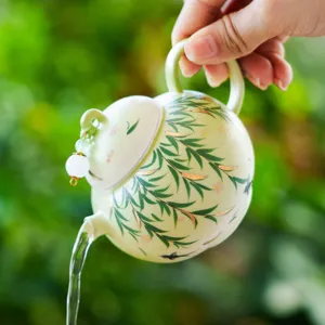 Green ceramic teapot for single person kung fu tea set with elegant willow pattern design