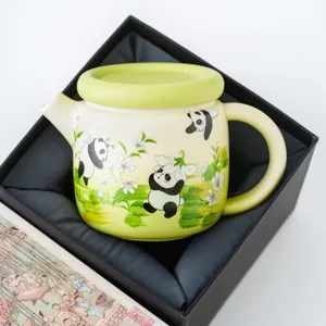 Ceramic teapot with cute panda and floral illustration, green lid and handle, gift box set.