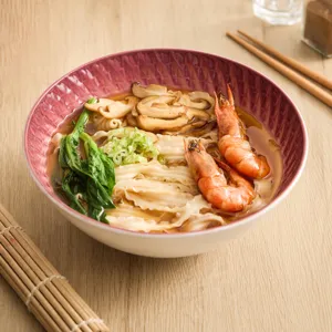Exquisite ceramic noodle bowl with stylish ribbed texture, perfect for home ramen and soups.