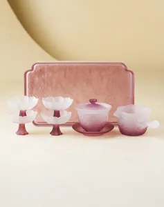 Detailed view of frosted purple glass lotus tea set, including gaiwan, fair cup and tray.