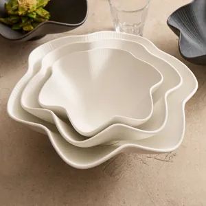White ceramic plum blossom bowl set, elegant flower-shaped striped soup bowl for home kitchen.