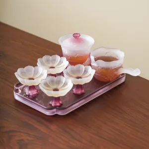 High-end frosted glass lotus tea set complete with gaiwan, pitcher, cups and matching tray.