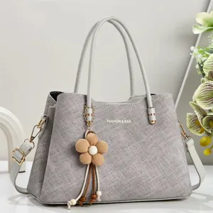 Grey textured tote shoulder bag for women, large capacity crossbody bag with flower charm.