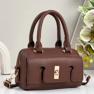 Elegant brown leather handbag for women, featuring a chic gold lock and versatile shoulder strap.