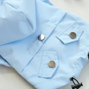 Light blue waterproof pet dog raincoat featuring a hood, metal buttons, and convenient drawstring.