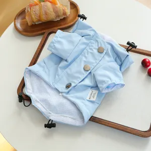 Light blue hooded pet raincoat for small dogs with breathable mesh lining. Perfect for daily walks.