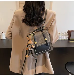 Vintage college style backpack for women, multi-functional shoulder and crossbody bag.