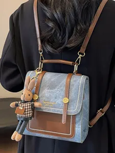 Vintage denim backpack for women stylish college style school bag with cute rabbit pendant.