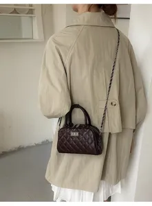 Chic quilted chain bowling shoulder bag for women, stylish crossbody handbag, new fashion.