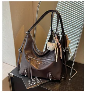 Brown large capacity motorcycle shoulder bag with front zip pocket and stylish hardware details.