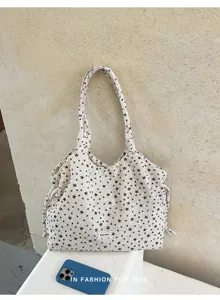 Borsa a tracolla casual da donna con stampa di stelle, grande capacità e stile chic.