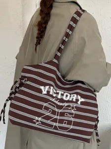 Borsa a tracolla in tela di grande capacità casual da donna, elegante a righe marroni.