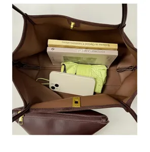 Large capacity leather tote bag interior detail view showing spacious storage and stylish design.
