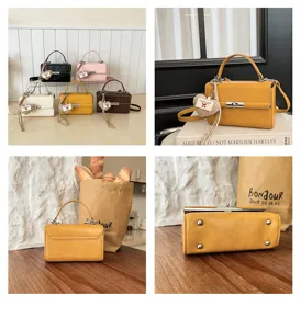 Detailed view of Korean niche top handle handbag, minimalist small square shoulder bag.