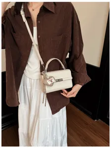 Korean style minimalist small square shoulder bag for women, chic PU leather handbag with strap.