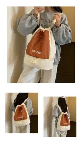 Vue détaillée du sac à dos à cordon en toile nylon décontracté avec poche zippée.