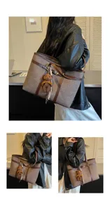 Retro brown tweed tote bag with leather trim and cute bear charm for women daily commuting detail.