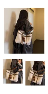 Stylish women's large capacity canvas tote bag with brown leather trim and cute bear pendant.