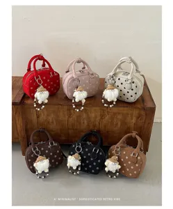 Korean style polka dot bowling bag with cute gnome charm, stylish retro commuter handbag for women.