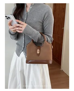 Minimalist brown suede handbag for women, chic retro top handle shoulder bag for commute.