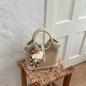 Korean style minimalist beige bucket bag crossbody shoulder bag for daily commute.