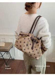 Elegante borsa shopper a pois con grande capienza, pratica borsa a spalla per ogni giorno.