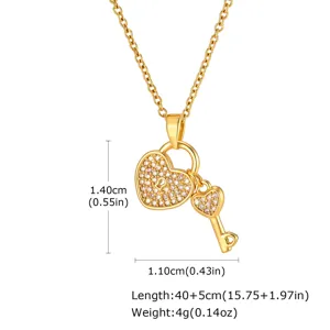 Gold stainless steel heart lock key pendant necklace with sparkling zircons for women.